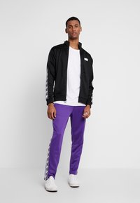 New Balance ATHLETICS CLASSIC TRACK JACKET - Trainingsvest - black