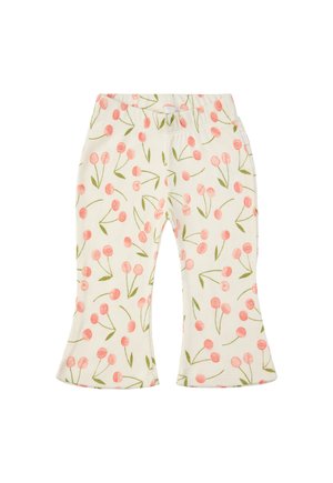 Pantalons en tissu côtelé avec un fond crème clair et un motif de fleurs de cerisier roses, présentant un ourlet évasé et une taille élastique.