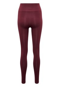 Burgunderfarbene Leggings mit hohem Taillenbund, aus elastischem Material gefertigt. Mit einem strukturierten Muster auf der Rückseite und eng anliegenden Beinen.