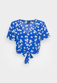 Top curto floral azul com decote em V, mangas curtas e frontal com laço. Apresenta padrões de margaridas brancas contra um fundo vibrante.