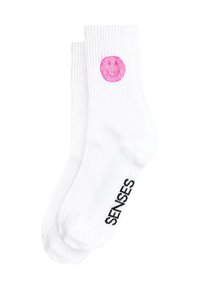 White cotton socks featuring a pink smiley face graphic and black "SENSES" text on the side, with ribbed texture and ankle length.