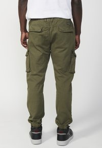 Koroshi JOGGER  - Donji dijelovi trenirke - verde   green