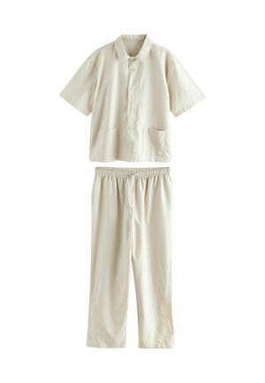 Short-sleeved, button-up shirt with two front pockets and matching elastic waistband pants, made of a light beige fabric.