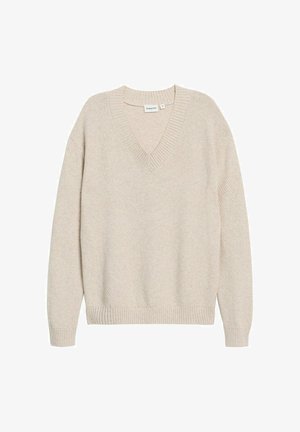 V-Ausschnitt Pullover in hellem Beige, gefertigt aus strukturiertem Strickstoff. Verfügt über einen gerippten Kragen und Bündchen für eine enganliegende Passform.