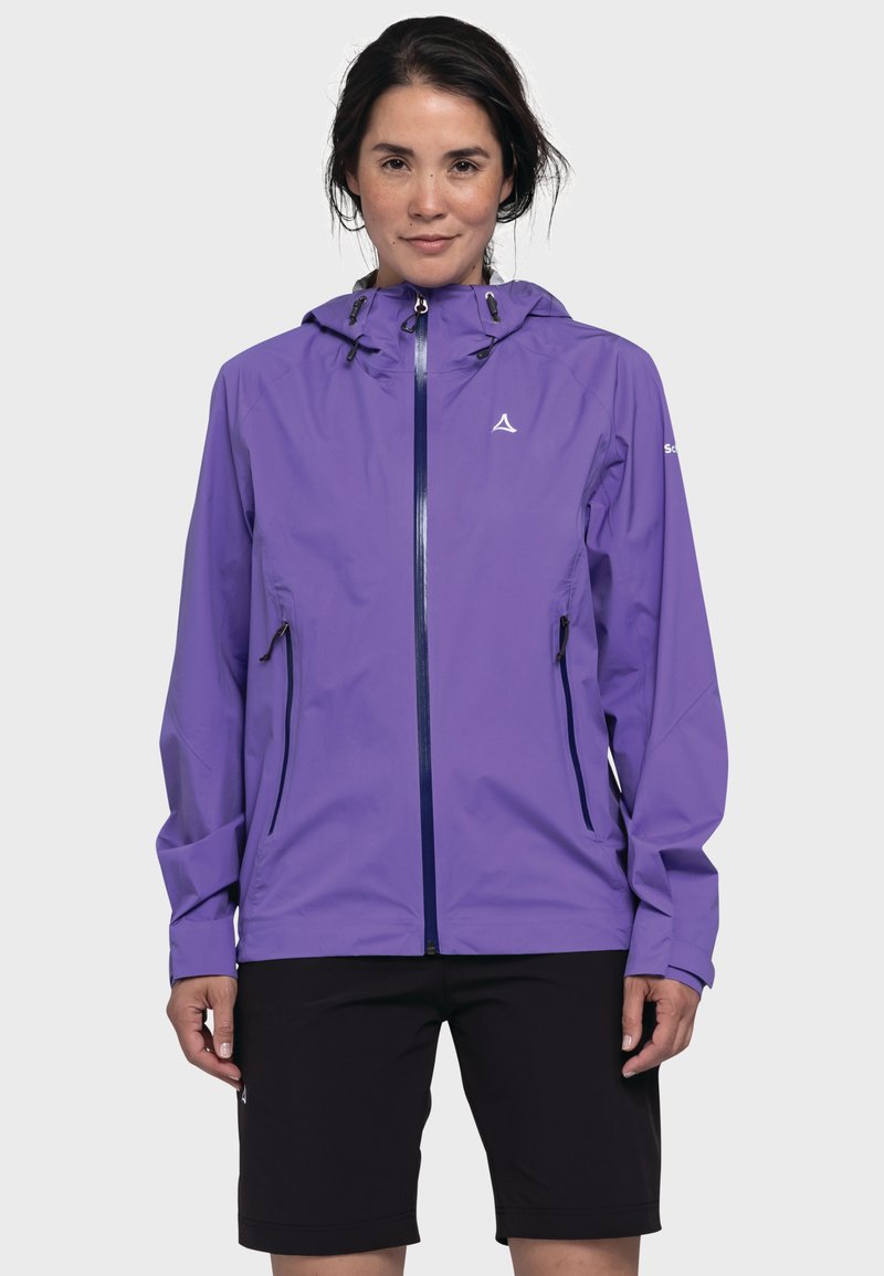 Lila wasserdichte Jacke mit einem Frontreißverschluss, verstellbarem Kapuzen, und zwei Seitentaschen. Strukturiertes Gewebe, entworfen für den Außeneinsatz.