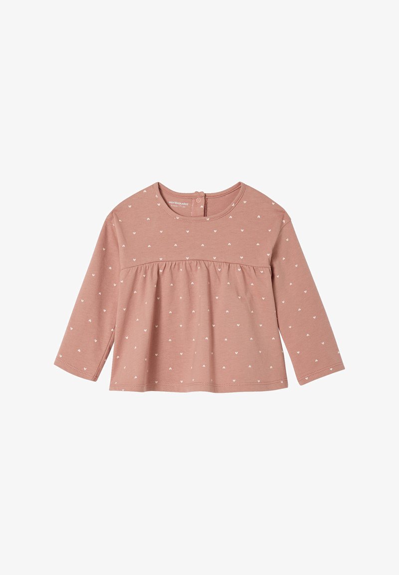 Langärmliges, blassrosa Oberteil aus Baumwolle mit weißen Herzmustern, runden Ausschnitt und gerafftem Taillendesign mit Knopfverschluss.