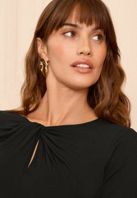 Love & Roses Hosszú ujjú felső - black knot front