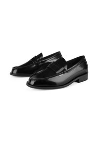 Black patent leather loafers with a sleek design, a raised front accent, and a low block heel detail. Smooth texture with stitched edges.