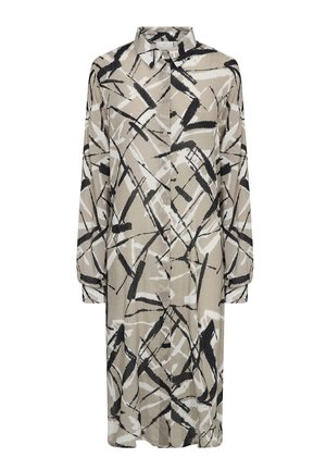 Lang, knap-op kjole i beige med sort og hvide abstrakte mønstre. Har en krave og lange ærmer, lavet af et tekstureret stof.