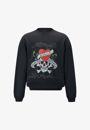 Černá mikina s potiskem lebky zdobenou červeným srdcem a páskou s nápisem "Láska zabíjí pomalu," s zelenými akcenty a textem.