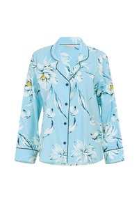 Parte superior de pijama floral azul claro con mangas largas, patrones de flores en blanco y amarillo, ribete negro y cierre de botones. Textura de tela suave.