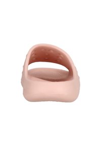 Lette pink letvægts klipklapper med åben hæl, tekstureret indersål og ventilationshuller for åndbarhed. Glat plastmateriale.