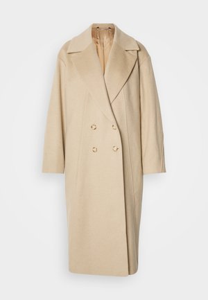 Cappotto in lana beige doppiopetto con ampi rever, maniche lunghe e due grandi bottoni. Tessuto liscio con una vestibilità oversize.