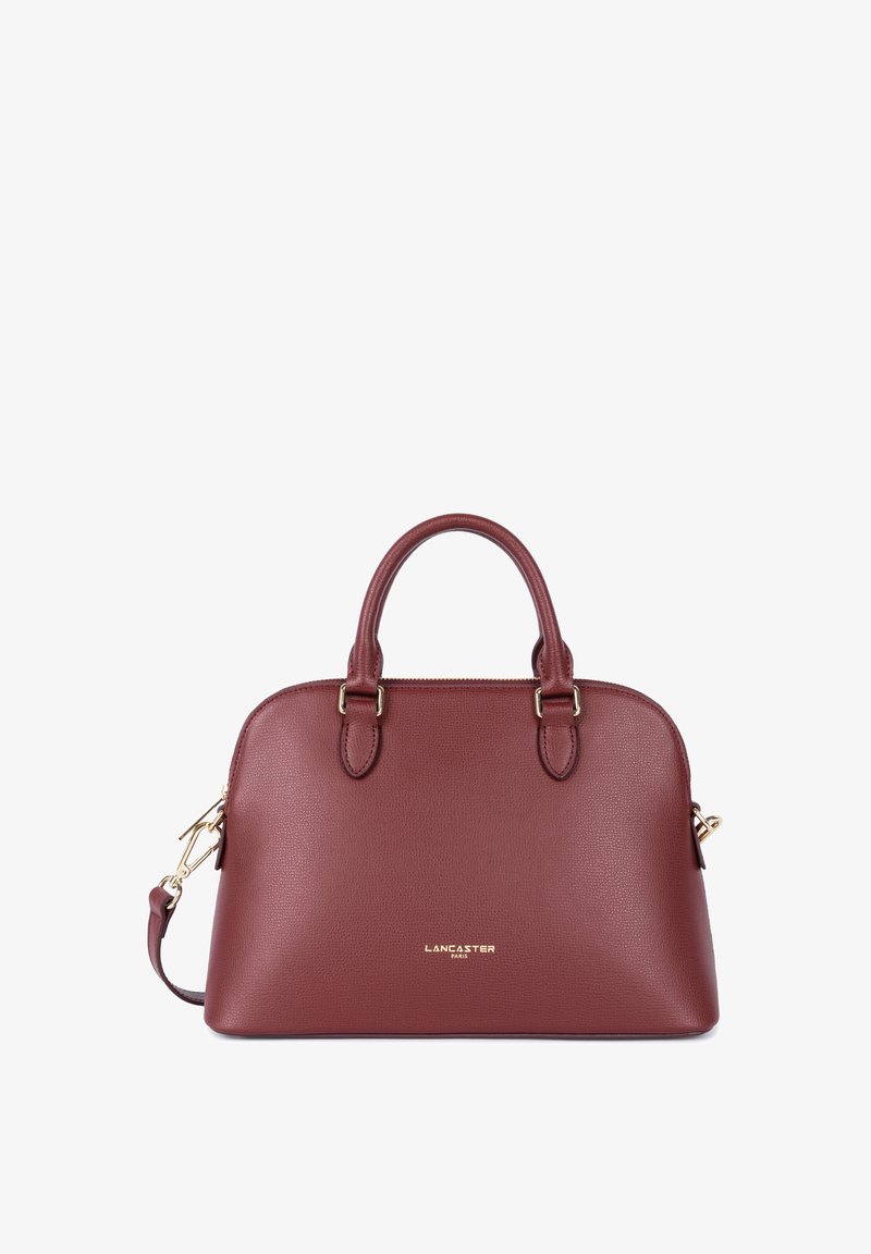 Borsa in pelle bordeaux con una forma strutturata, doppie maniglie superiori, tracolla rimovibile e logo dorato sul davanti.