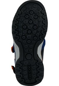 Svart skosula med cirkulära mönster, storlek 27-tryck och "GEOX"-varumärket präglat i bottenmitten.