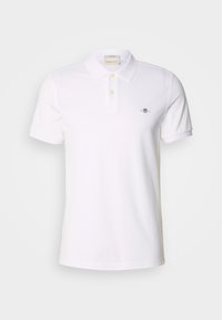 White short-sleeve polo shirt with two buttons, collar, and small embroidered logo on left chest, displayed on plain background.