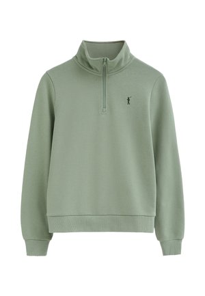 Sweatshirt pullover vert clair avec un col à fermeture éclair partielle et un petit logo de golfeur brodé sur la poitrine gauche.