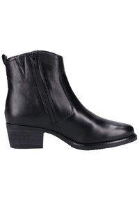 Bottine en cuir noir avec fermeture éclair latérale, talon bas empilé, bout rond et languette à l'arrière.