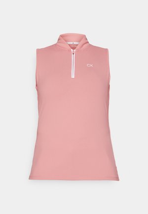 Sleeveless polo in soft, light pink fabric with a half zipper and high collar. Features white CK logo on the left chest. Smooth texture.