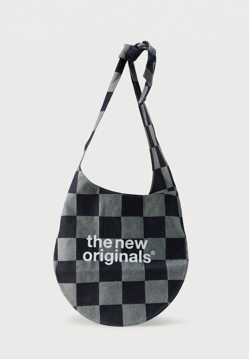 Black and gray checkered fabric shoulder bag with adjustable knot strap and white text "the new originals" on front.