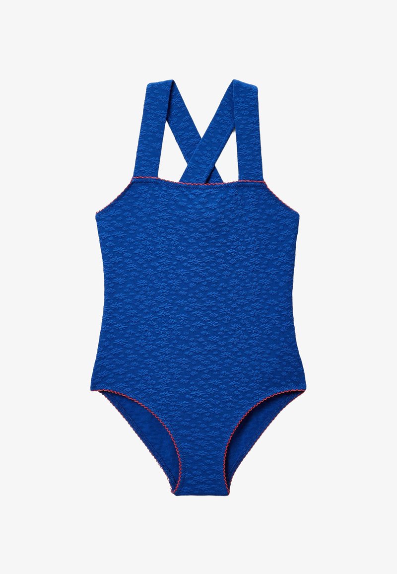 Maillot de bain une pièce bleu texturé avec de larges bretelles croisées sur les épaules et des surpiqûres contrastantes orange le long des bords.
