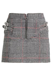 Svart och vit houndstooth mini kjol med röda accentlinjer, utrustad med en framzipper och två justerbara sidoband.