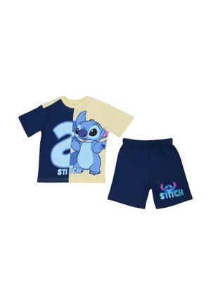 Ensemble deux pièces pour enfant avec chemise à manches courtes bicolore bleu marine et crème, avec le personnage Stitch, et short bleu marine à taille élastique avec impression Stitch.