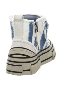 High-top sneakers featuring a white and blue striped canvas upper with frayed edges, a zip closure, and textured rubber sole.