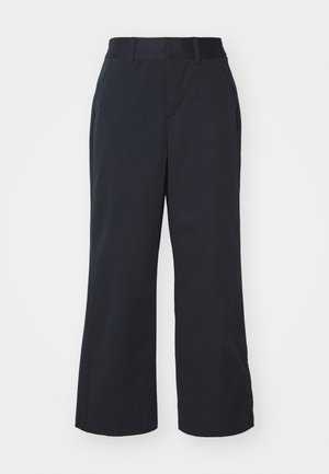 Black wide-leg pants with a smooth fabric texture, featuring a standard waistband and side pockets. Minimalist design, no visible patterns.