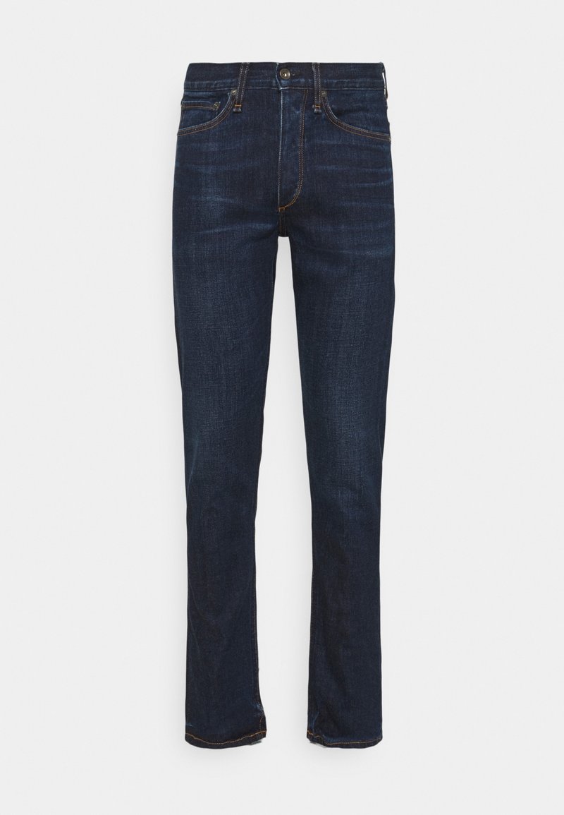 Jeans de mezclilla azul oscuro con diseño de pierna recta, costuras visibles y cinco bolsillos. La tela tiene una textura suave y un ligero desvanecimiento.
