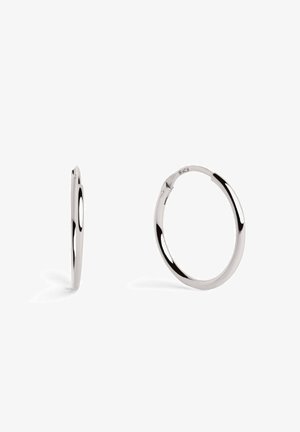 Hope hopea, joissa on sileä ja kiillotettu pinta. Pyöreä muoto, jossa on saumaton saranat. Ohut profiili, joka korostaa virtaviivaista muotoilua.