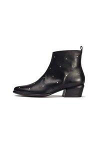 Black leather ankle boot with a pointed toe, silver stud accents, and a low, square heel. Smooth texture and minimalist design.