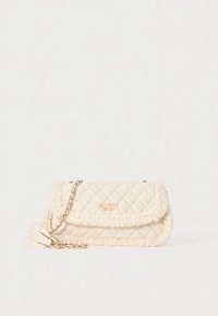 Quilted cream bag with a fuzzy trim, gold hardware, and a chain strap. Features a flap closure with "GUESS" logo embossed on the front.