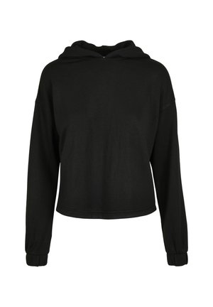 Melna krota kapuce ar garām piedurknēm, elastīgām aprocēm un brīvu piegriezumu, izlikta uz vienkrāsaina baltā fona.