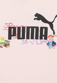 Felpa rosa chiaro con grande logo nero "PUMA", personaggi dei cartoni animati SpongeBob e Patrick e accenti di testo colorati. Materiale misto cotone.