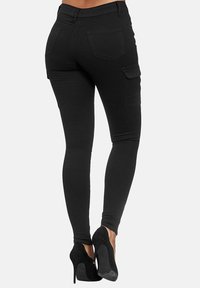 Elara Pantalones cargo - schwarz