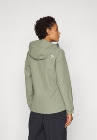Light green waterproof jacket with a hood, elastic cuffs, and a small logo on the back. Smooth texture and minimalist design.