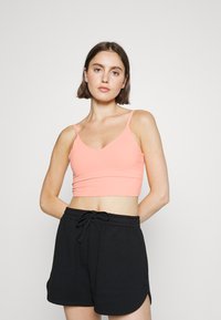 Athleta ELATION V-NECK CROP A-C - Sutiã desportivo de suporte ligeiro - sunset glow