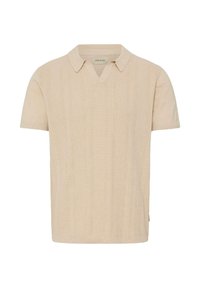 Beige gebreid poloshirt met korte mouwen, een gestructureerd patroon en een V-vormige kraag.