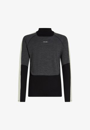 Pull à manches longues noir et gris foncé avec col haut, rayures beige clair sur les manches et logo "icebreaker" sur la poitrine.