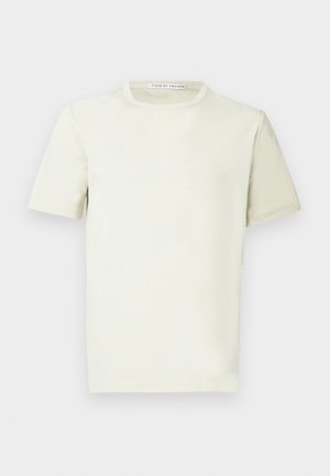 Light pastel green t-shirt with short sleeves, round neckline, and a soft texture. Features a label at the neck reading "Tiger of Sweden."