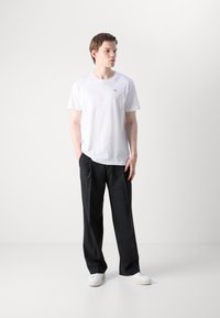 Calvin Klein Jeans REGULAR FIT TEE WITH BOLD BACK PRINT - T-shirt con stampa - bright white