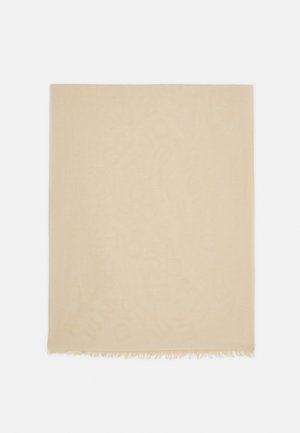 Beige rechthoekige sjaal met subtiel tonaal patroon en franjes aan de randen, plat gelegd op een witte achtergrond.