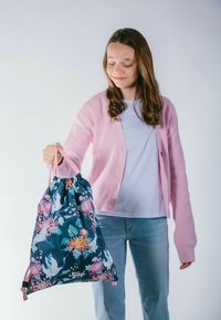 Drawstring backpack in dark blue fabric with vibrant floral design featuring cranes and chrysanthemums. Soft texture with pink accents.