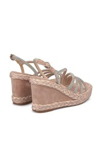 Sandalias de cuña con acabado de ante rosa, adornadas con brillantes correas y una suela de yute trenzado. Diseño de punta abierta; correa ajustable en el tobillo.
