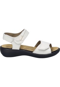 Hvide lædersandaler med justerbare stropper, åben tå og en sort skridsikker såle. Har en rund knapdetalje og polstret indersål.