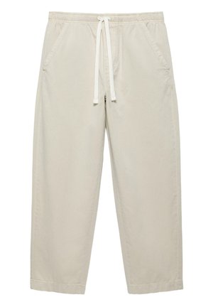 Béžové neformální kalhoty s elastickým pasem, bílým stahovacím šňůrkou a bočními kapsami, zobrazené na bílém pozadí.