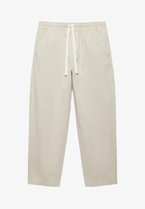 Beige Freizeithose mit elastischem Bund, weißem Kordelzug und Seitentaschen, auf weißem Hintergrund präsentiert.