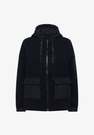 Musta hupullinen takki, jossa on etuvetoketju, kaksi suurta napillista taskua ja säädettävät nyöritykset hupussa.