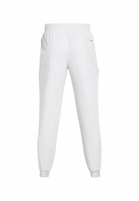 Weiße Jogginghose mit elastischem Bund und Bündchen, ausgestattet mit einer mit Reißverschluss versehenen Gesäßtasche.